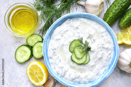 Bild auf Leinwand Tzatziki - yoghurt sauce with cucumber and dill.Top view .