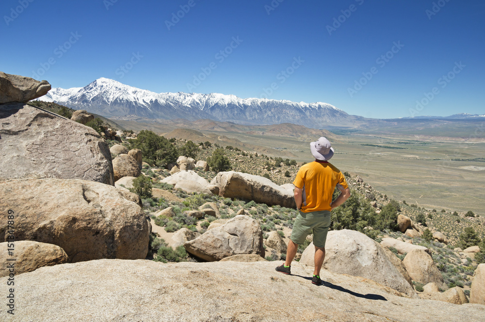 Man Looking At Mountains
