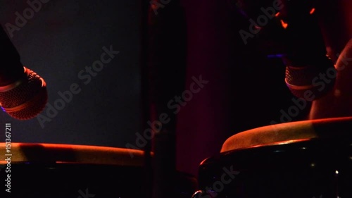 Hitting the conga drums