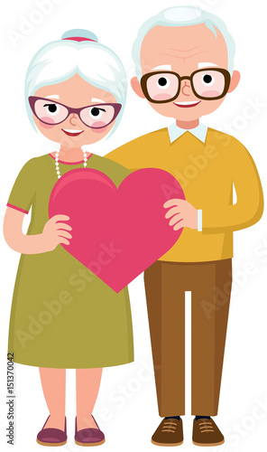 Senior married couple of lovers in full length hold the symbol of love heart