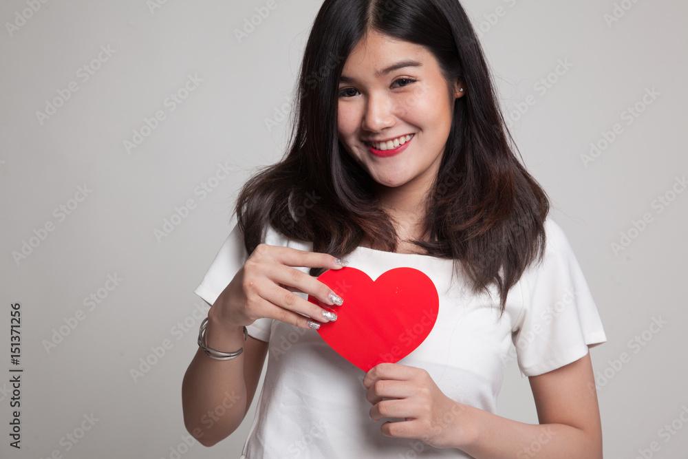 Asian woman with red heart. Asian woman with red heart.