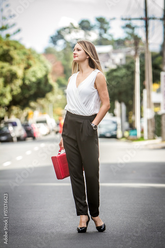 outdoor portrait of young gorgeous lady, woman in city, urban casual lifestyle shot