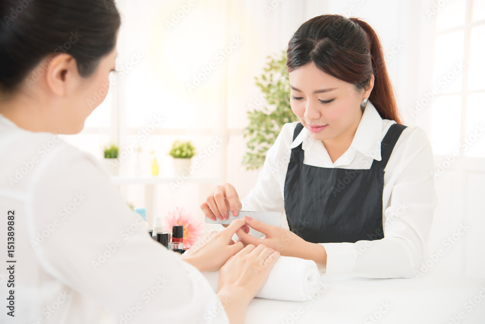manicure in beauty salon nail filing close up manicure in beauty salon nail filing close up