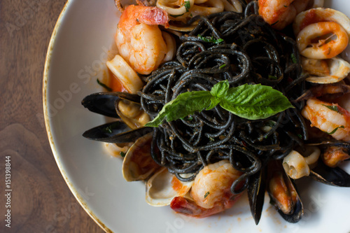 Vászonkép Black spaghetti pasta with an assortment of seafood
