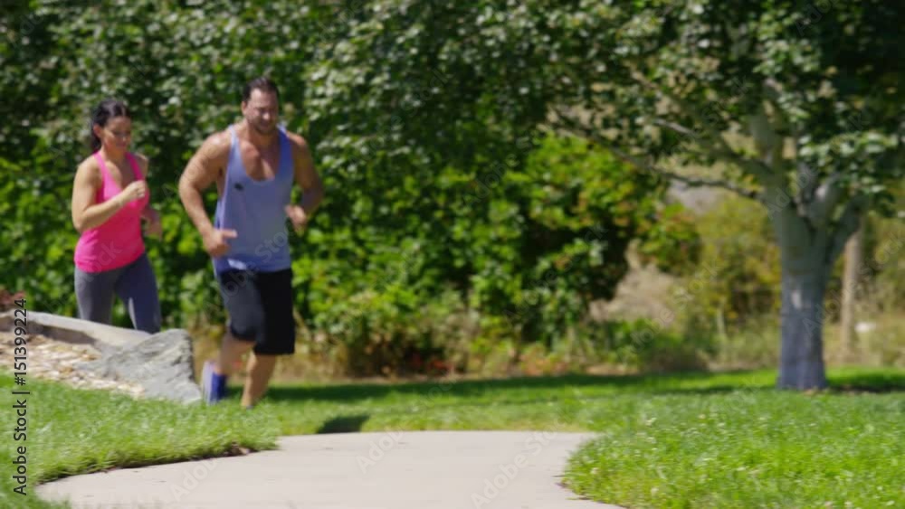 Couple running at park Couple running at park