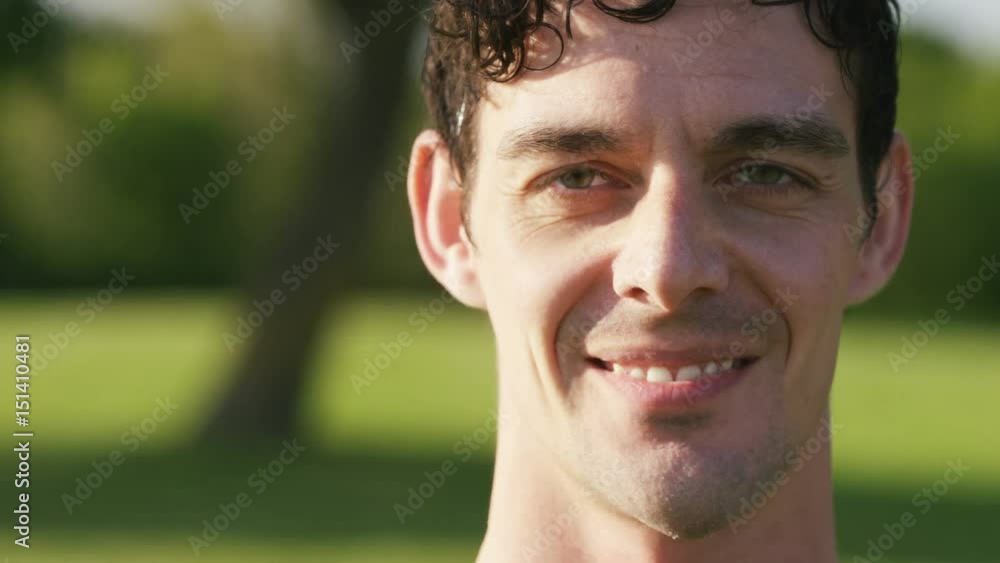 Portrait of smiling man outdoors, in slow motion, with space for text Portrait of smiling man outdoors, in slow motion, with space for text