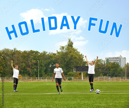Boys playing football at st...