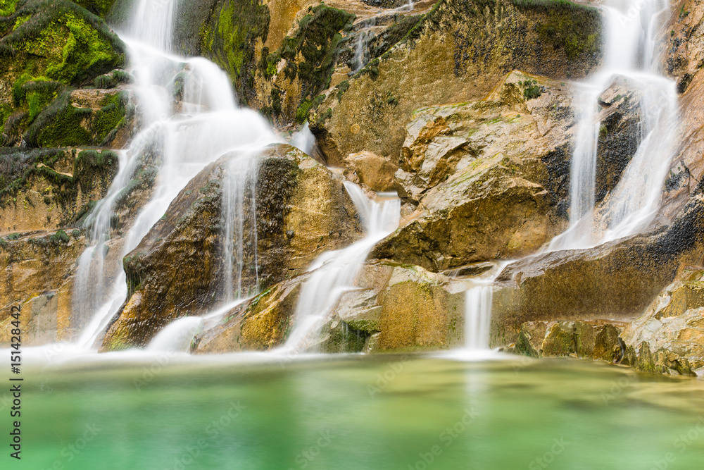 Obraz premium Emerald Water of the Torre Torrent Falls. Silk water. Tarcento, Friuli to discover