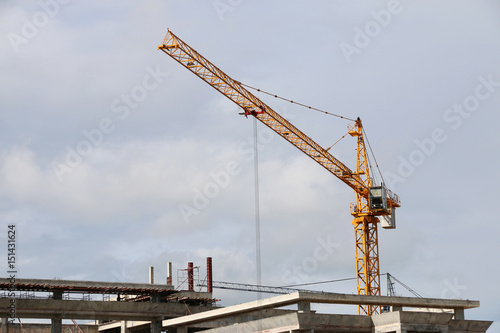 Construction cranes on construction sites.