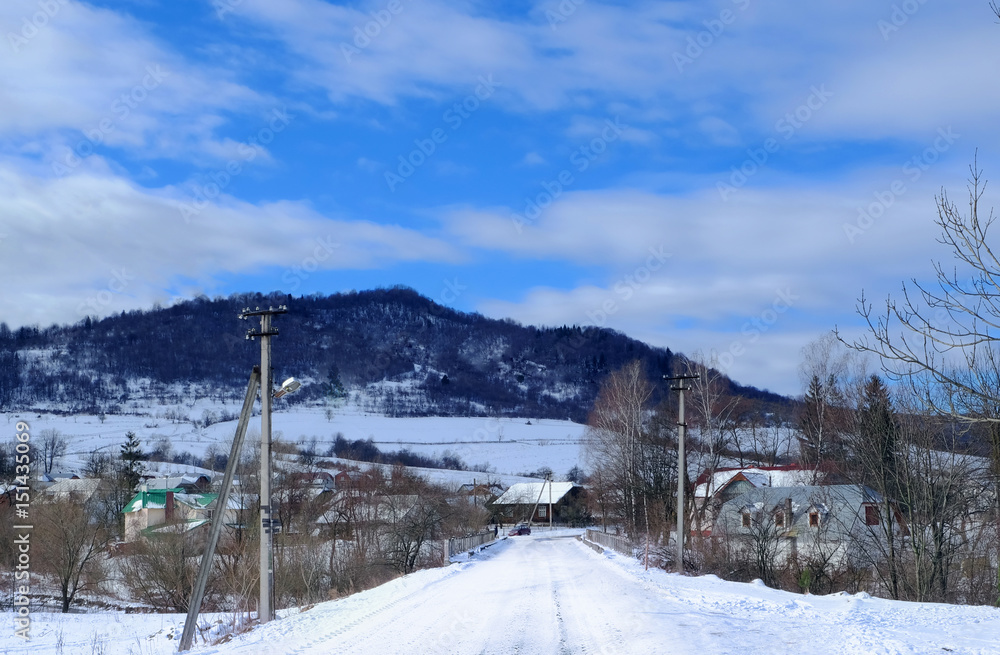 Beautiful landscape with road at resort on winter day Beautiful landscape with road at resort on winter day