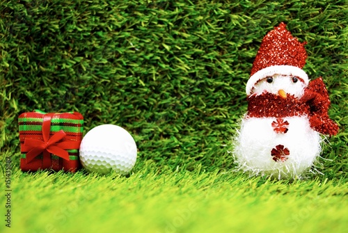 Golf ball with Christmas ornament