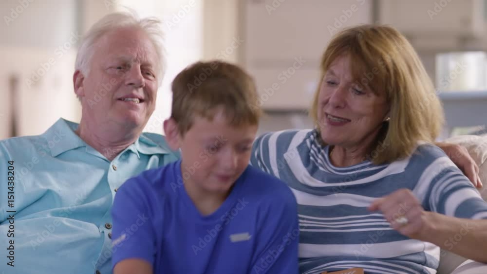 Boy talking selfie with grandparents Boy talking selfie with grandparents