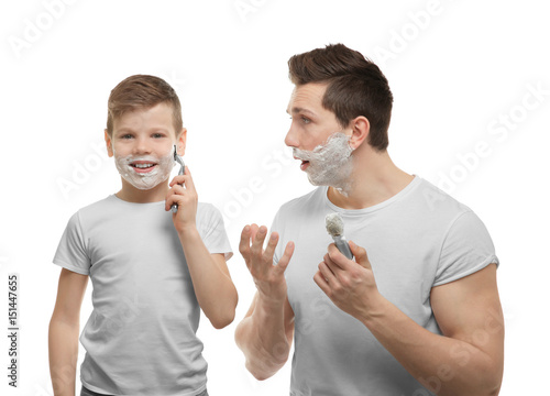 Father and son shaving on w...