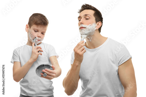 Father and son shaving on w...