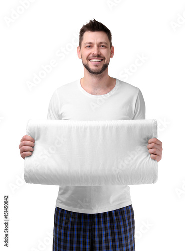 Young happy man in pajamas ...