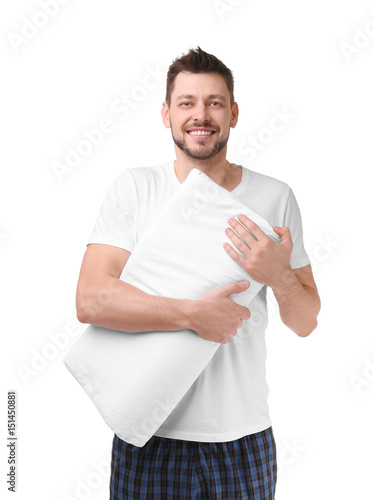 Young happy man in pajamas ...