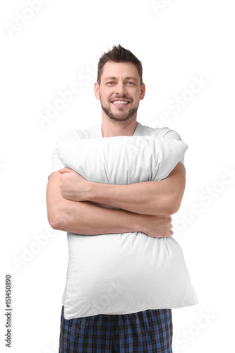 Young happy man in pajamas ...
