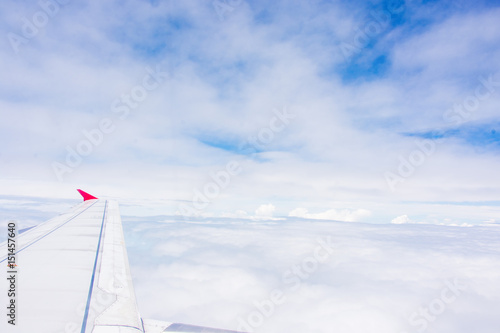 wing airplane on the sky blue and white cloud