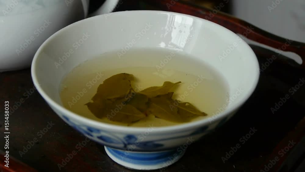 Tea shaking in teacup.china. Tea shaking in teacup.china.
