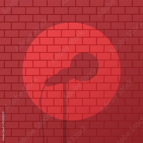 red brick spotlight stand up comedy stage