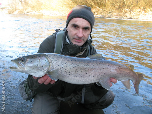 Fishing - fisherman catched danube salmon