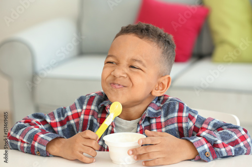 Cute African American boy e...