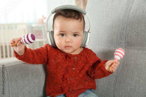 Cute little baby with headp...