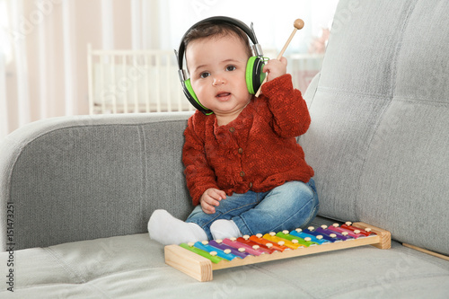 Cute little baby with headp...
