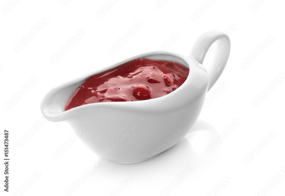 Delicious cranberry sauce in boat on white background Delicious cranberry sauce in boat on white background