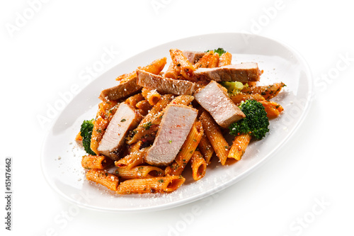 Pasta with vegetables on white background