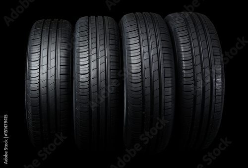 Car tires on black background