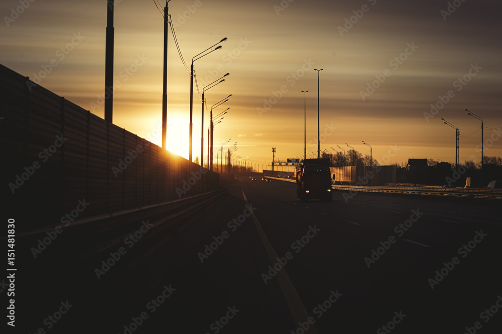 Sunrise early morning on highway road in Russian