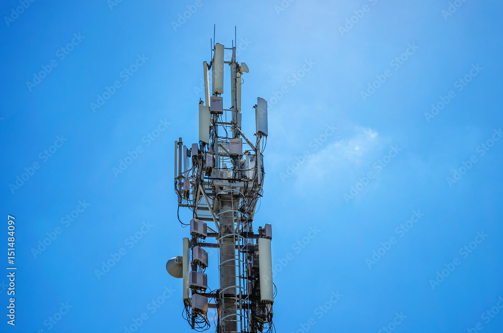Large Communications Tower on a Blue Sky Large Communications Tower on a Blue Sky