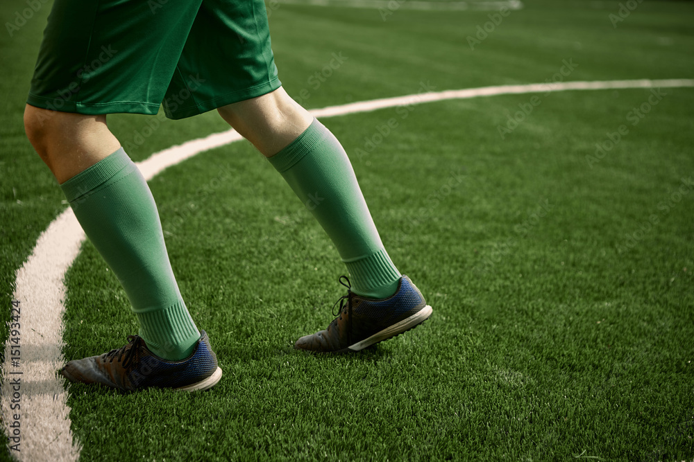 Thq legs of soccer football player