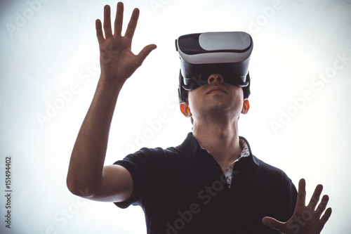 Bild auf Leinwand Portrait of a man working in three-dimensional space in virtual reality