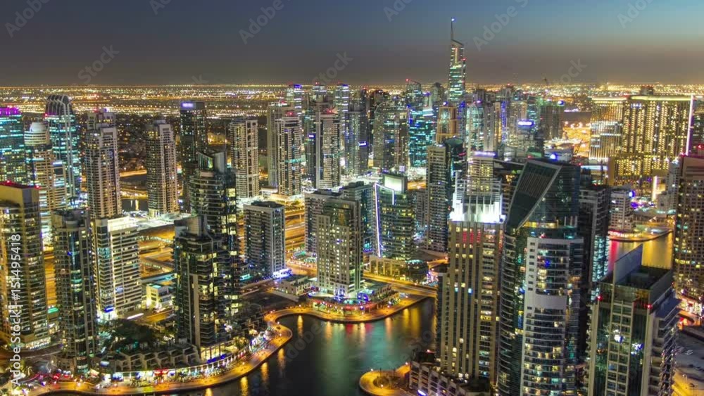 Dubai Marina with modern towers from top of skyscraper transition from day to night timelapse Dubai Marina with modern towers from top of skyscraper transition from day to night timelapse