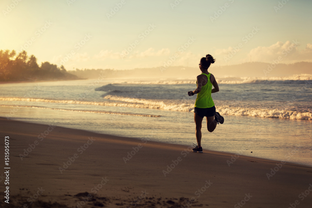 healthy lifestyle young fitness woman running on sunrise beach healthy lifestyle young fitness woman running on sunrise beach