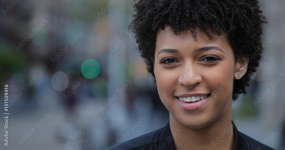 Young woman in city face portrait Young woman in city face portrait