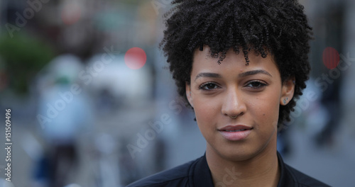 Canvastavla Young woman in city face portrait