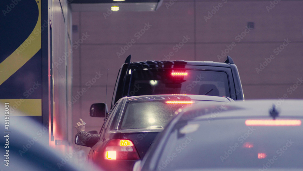 Fototapeta premium Man's hand paying in cash in auto fast food