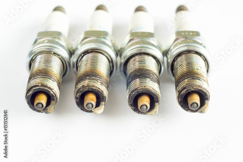 Set of damaged spark plugs