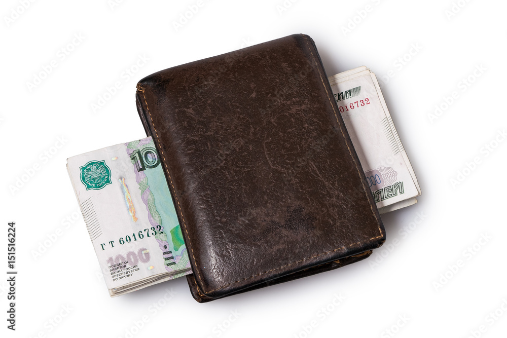 Old leather brown wallet with one thousand rubles banknotes isolated on white background Old leather brown wallet with one thousand rubles banknotes isolated on white background