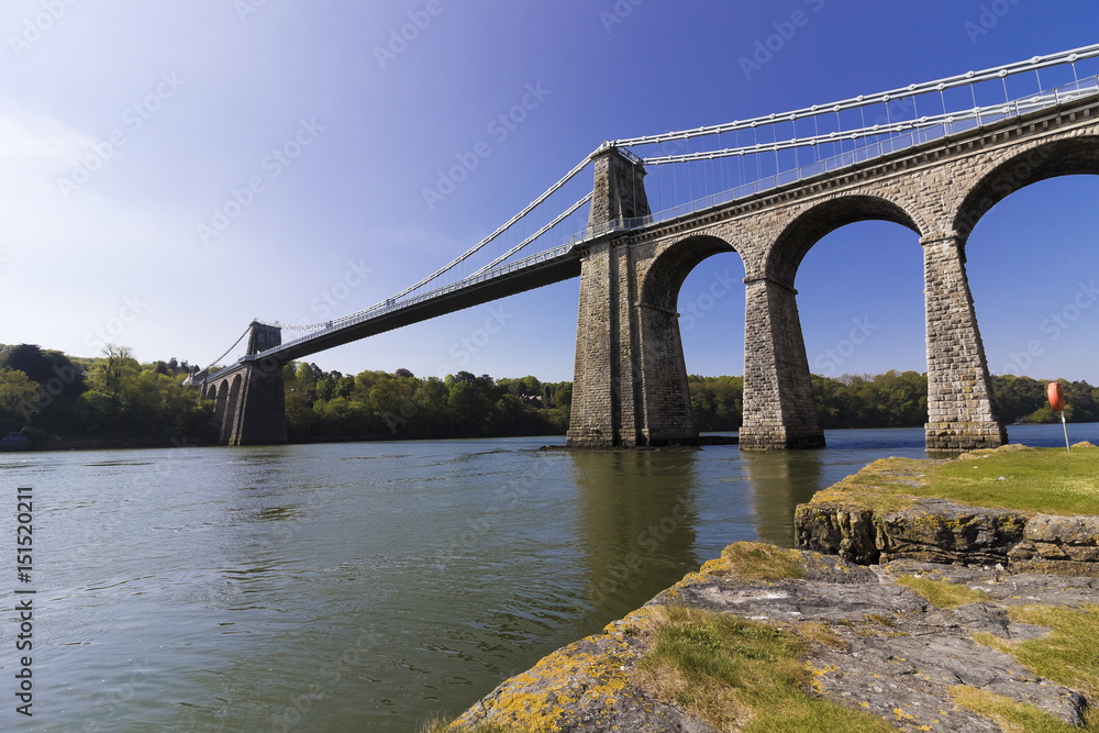 Fototapeta premium View of the historic Menai Suspension Bridge spanning the Menai Strait, Anglesey, North Wales