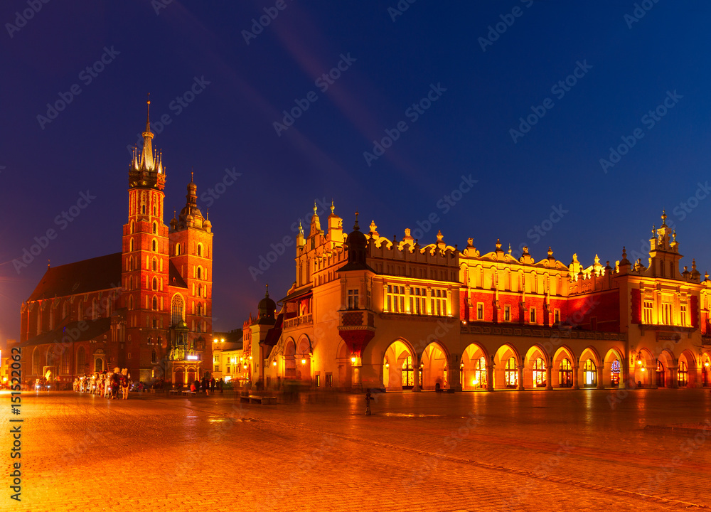 Market square with Sukennice st Mry cathedral in Krakow at night, Poland