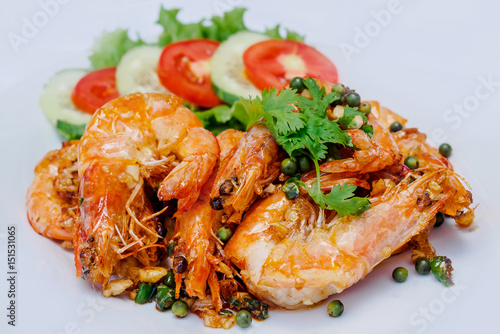 Shrimp baked with pepper on white background