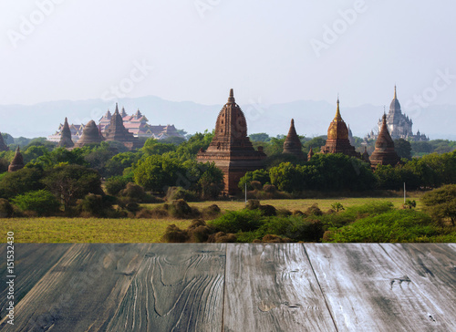 vintage wood terrace or wooden floor with view of Beautiful Ancient land in Bagan with thousands of ancient temples in Myanmar.