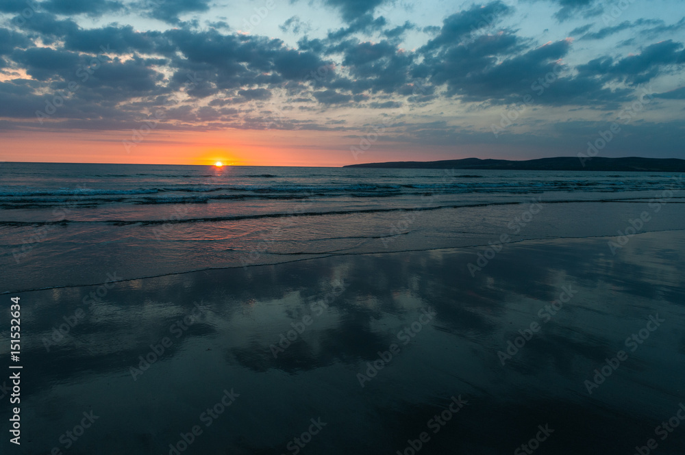 Scenic beach sunset landscape on the wild atlantic way coast in county Kerry, Ireland
