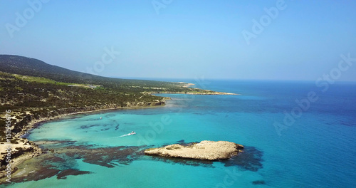 Landscape of a transparent clear blue Mediterranean Sea. The island of Cyprus. Resort. blue lagoon Yacht