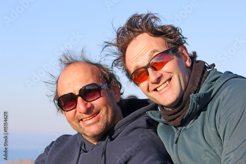 Men on a windy day