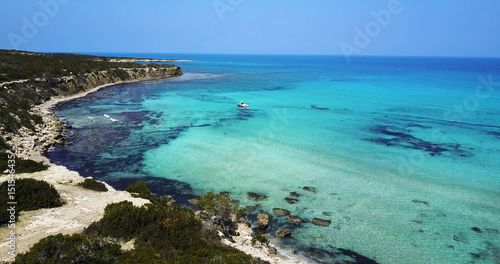 Fototapeta Naklejka Na Ścianę i Meble -  Landscape of island  a transparent clear blue Mediterranean Sea. The island of Cyprus. Resort.